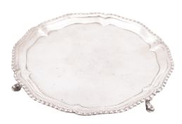 A George III small silver salver or waiter, of shaped circular outline,