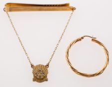 A 9ct gold and diamond tie slide and an odd gold hoop earring,