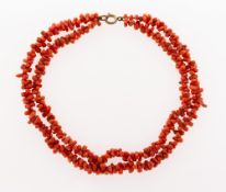 A double row coral necklace, base metal jump ring and bolt ring, length of inner row approx. 34.