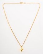 A double sided diamond and ruby heart pendant with chain,