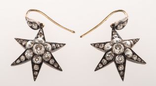 A pair of Victorian diamond six point star drop earrings,