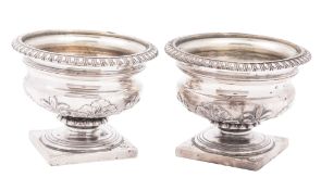 A pair of George III silver salts, of circular urn form, with ovolo borders,