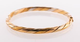 A tri-colour bangle, a hinged bangle of twist design,