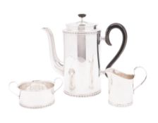 A 20th century three-piece Swedish coffee service, designed by Vera Ferngren, of cylindrical form,
