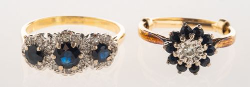 Two sapphire and diamond rings, including a cluster style ring,