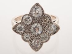 A diamond cocktail ring, the ring of diamond shape with scalloped edges,