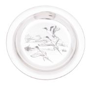 A cased modern silver dish, circular form and decorated in the centre with a skein of ducks,