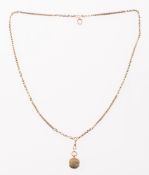 A Victorian fob chain and a gilt keepsake locket,