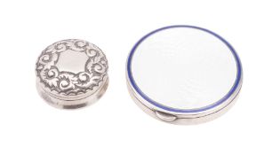 A late 19th/ early 20th century silver and enamel compact, circular form,