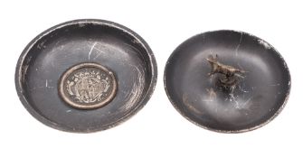 A small continental parcel-gilt dressing table dish, circular form with a cow finial, marks worn,