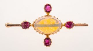An antique opal and ruby brooch, circa 1880-1910,