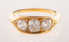 An antique three stone diamond ring, set with three old-cut diamonds, diamonds approx. 1.