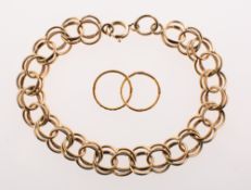 A double link bracelet and a pair of sleeper earrings,