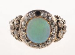 An antique opal and diamond ring, (possibly Edwardian),