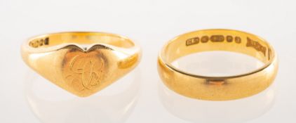 Two 18ct gold rings, including an 18ct gold wedding band, UK hallmark, size K, 3.