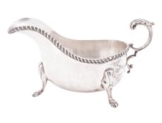 A George V silver sauce boat, shaped oval form,