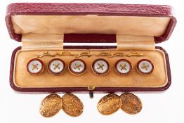 A pair of cufflink's and a boxed set of six dress buttons,