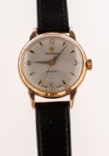 Garrard, London a gentleman's 9K gold wristwatch,