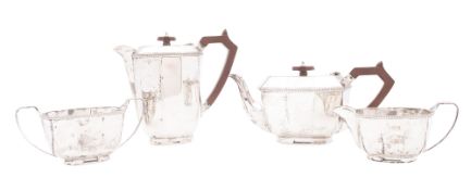 A WWII period four-piece silver tea set, of octagonal form, with angular handles,