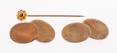A pair of 9ct gold cufflink's and a stick pin, the 9ct gold oval cufflink's,