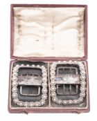 A pair of early Victorian silver mounted steel shoe buckles,