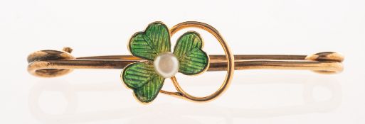 An antique enamel and pearl three leaf clover brooch, circa 1895-1910,