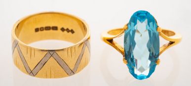 An 18ct gold wedding band and a dress ring,