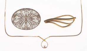 A small mixed group of jewellery, including an openwork brooch, pin and safety catch fitting,