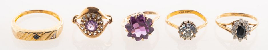 A group of five dress rings, including a 9ct gold ring,