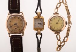 Two gold lady's wristwatches and one other to include: A lady's 9K gold wristwatch,