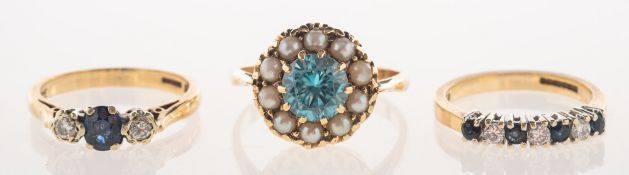 A group of three rings, including a 9ct gold half eternity style ring,