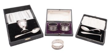 Three silver cased sets, including a cased pair of napkin rings,