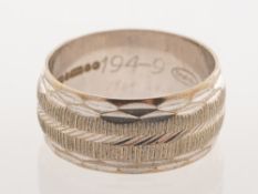 A 1970's 9ct white gold wide wedding band,