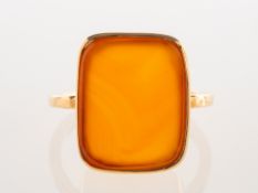 A carnelian set intaglio ring, of rectangular form,