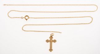 A cross pendant and broken chain, an ornately carved cross pendant, marked 9ct to verso,