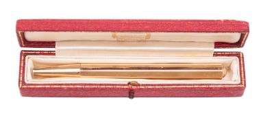 A 20th century cased 9ct. gold propelling pencil, by Cartier