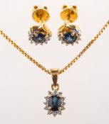 A sapphire and diamond pendant with chain and a pair of sapphire and diamond earrings,