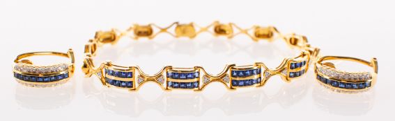 An 18ct gold sapphire and diamond bracelet and a pair of sapphire and diamond half hoop earrings,
