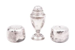 A pair of mid-20th century Danish silver salt & pepper shakers, by Henning Koppel, for Georg Jensen,