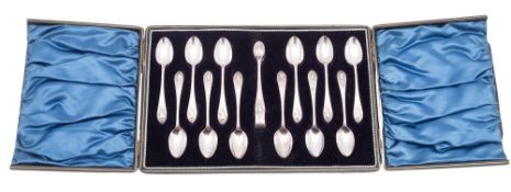 A late Victorian cased set of twelve silver tea/ coffee spoons and matching sugar tongs,