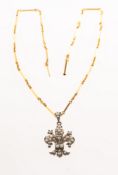 A Victorian Fleur de Lis pearl pendant with chain, pendant in the form of a Fleur de Lis,