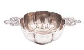 A late 19th century Dutch silver brandy bowl, of polyfoil outline, with pelleted decoration,