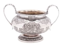 A George IV two-handled silver sugar bowl, of squat circular form,