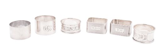 Six silver napkin rings, three initialled, mixed makers & dates; the largest 1.75