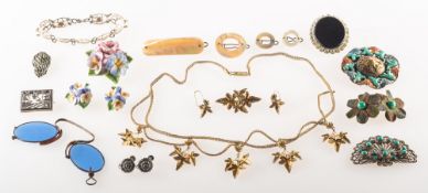 A small group of costume jewellery, including a matching set of gilt leaf designed jewellery,