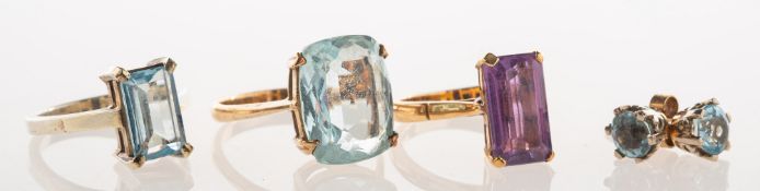 A small group of jewellery, including a 9ct gold ring, claw set with an oval mixed-cut aquamarine,
