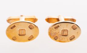 A pair of 9ct gold cufflink's, bar and toggle fitting, UK hallmark to front face, 12.5grams.