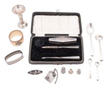 A small mixed lot of silver, comprising of: a cased part vanity set, a mounted horn napkin ring,
