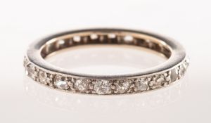 A full diamond eternity ring, grain set with an array of vari-cut old-cut diamonds, diamonds approx.