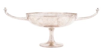 An Edwardian two-handled silver dish, circular form, with twin,